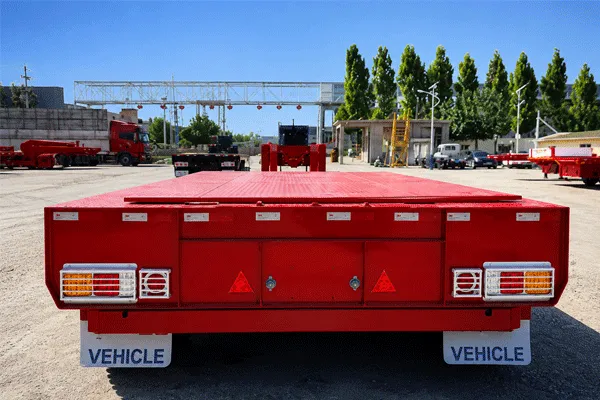 Guía de remolques de plataforma baja: Cómo elegir el remolque de plataforma baja adecuado para el transporte de cargas pesadas